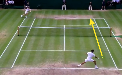 Federer takes his forehand down the line off the return