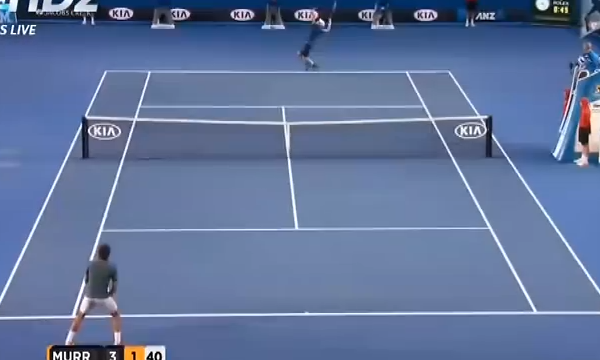 Federer waiting to return Murray's serve on the ad court