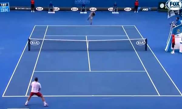 Wawrinka returning Djokovic's serve on the ad court